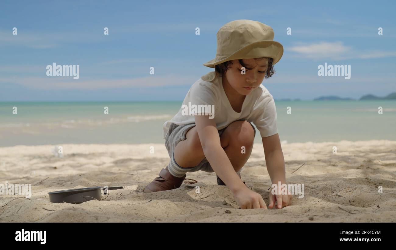 Happy asian family playing at the beach hi-res stock photography and ...