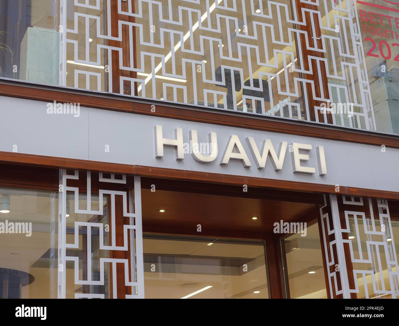 Vienna, Austria - August 8, 2022: Huawei logo on old building wall. Huawei is leading global provider of information and communications technology inf Stock Photo