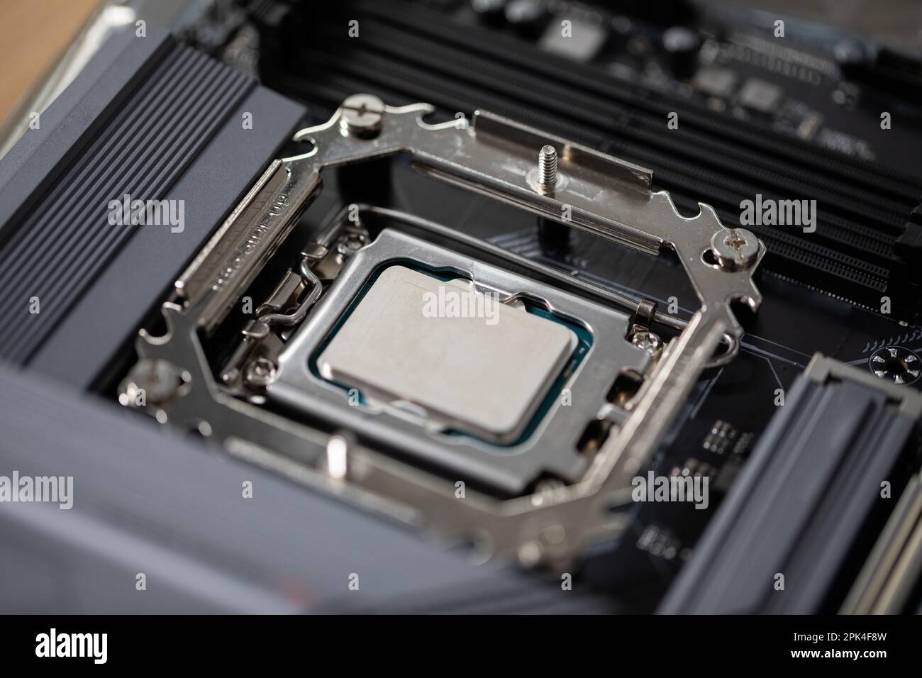 Replacing and installing a new processor in a home laptop computer Stock Photo