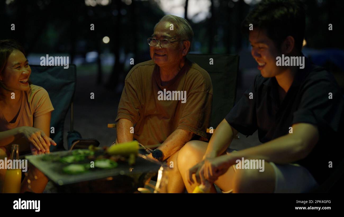 Happy asian family playing at the beach hi-res stock photography and ...