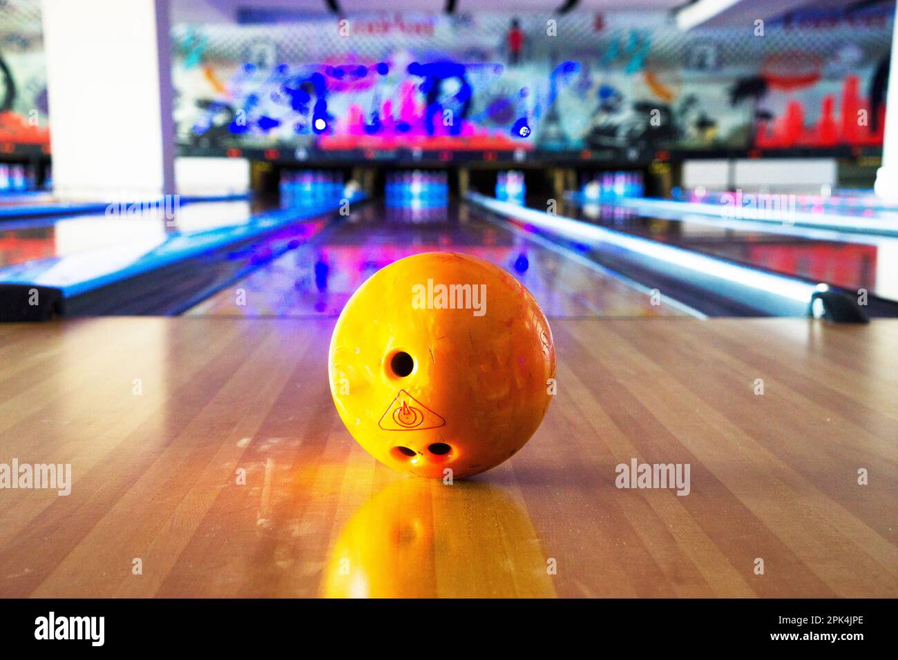 Stand with colorful bowling balls in club no people Stock Photo Alamy