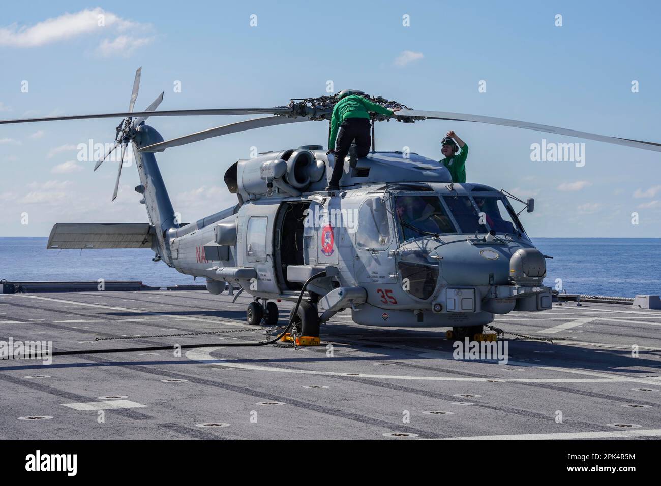 NATUNA SEA (Mar. 27, 2023) Sailors assigned to Helicopter Maritime ...