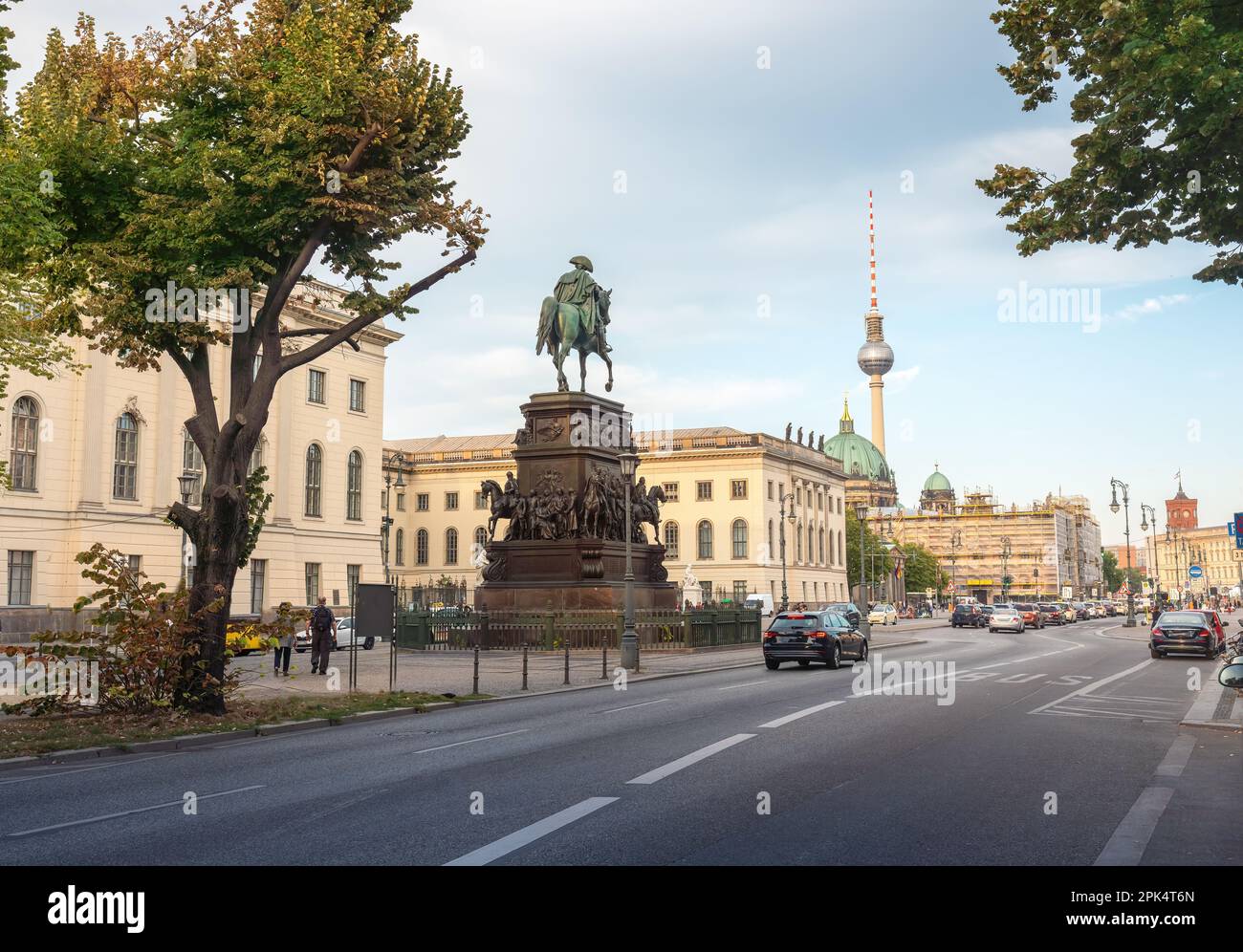 Unter den Linden Boulevard with Frederick the Great Statue and Fernsehturm TV Tower - Berlin, Germany Stock Photo