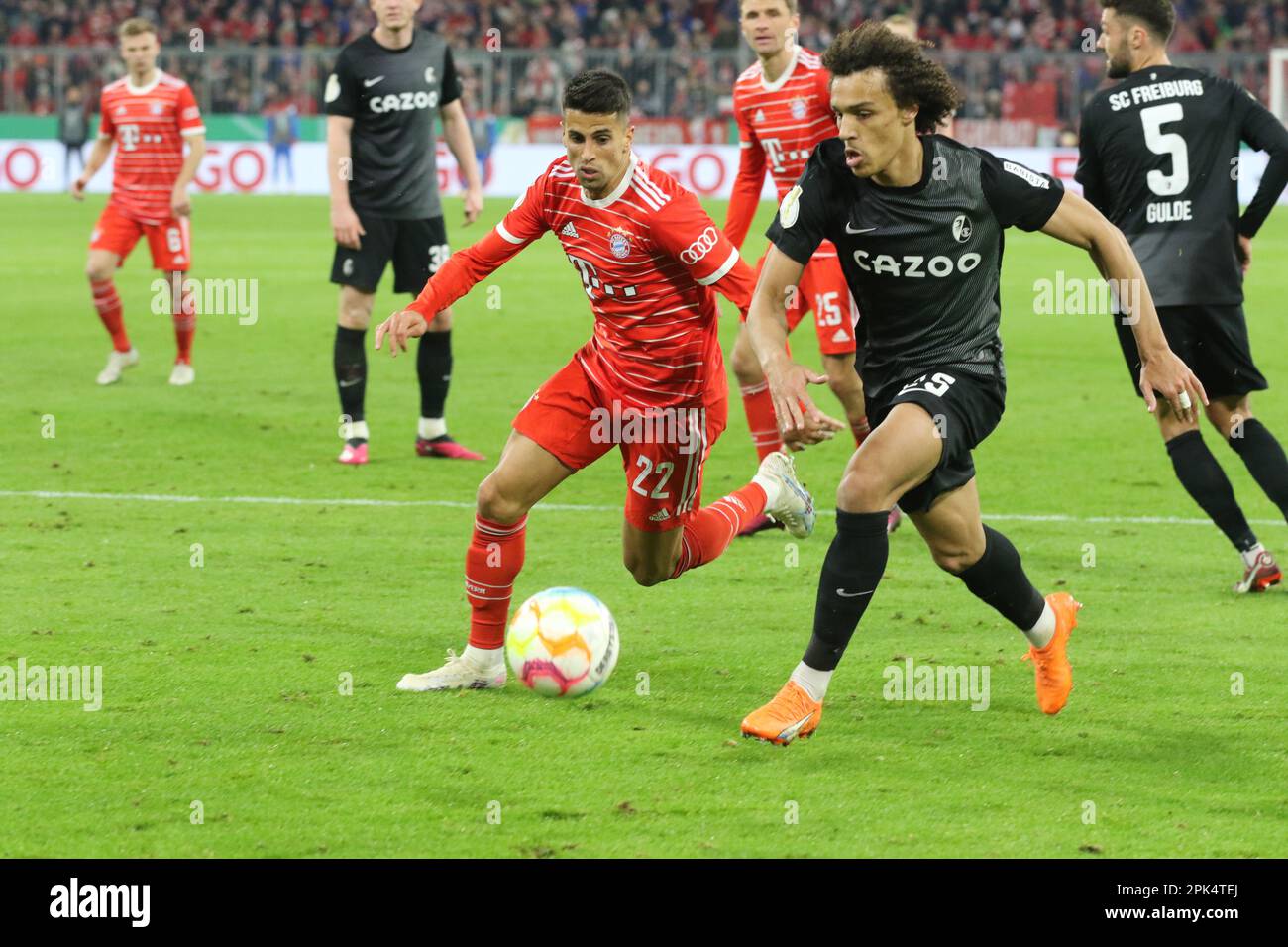 Munich, Germany . 04th Apr, 2023. MUNICH, GERMANY - APRIL 04: 22 Joao CANCELO vs #25 Kilian SILDILLIA of Freiburg during the DFB Cup quarterfinal match between FC Bayern München and SC Freiburg at Allianz Arena on April 04, 2023 in Munich, Germany.DFB-Pokal - DFB Cup - Football match between Fc Bayern Muenchen and SC FREIBURG in Munich on 4. April 2023, 1:2 - DFB Fussball, (Photo and copyright @ ATP images/Arthur THILL (THILL Arthur/ATP/SPP) Credit: SPP Sport Press Photo. /Alamy Live News Stock Photo