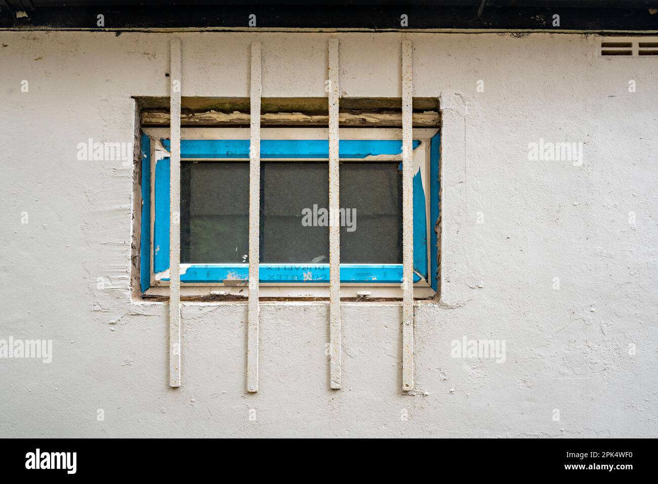 Window behind bars Stock Photo