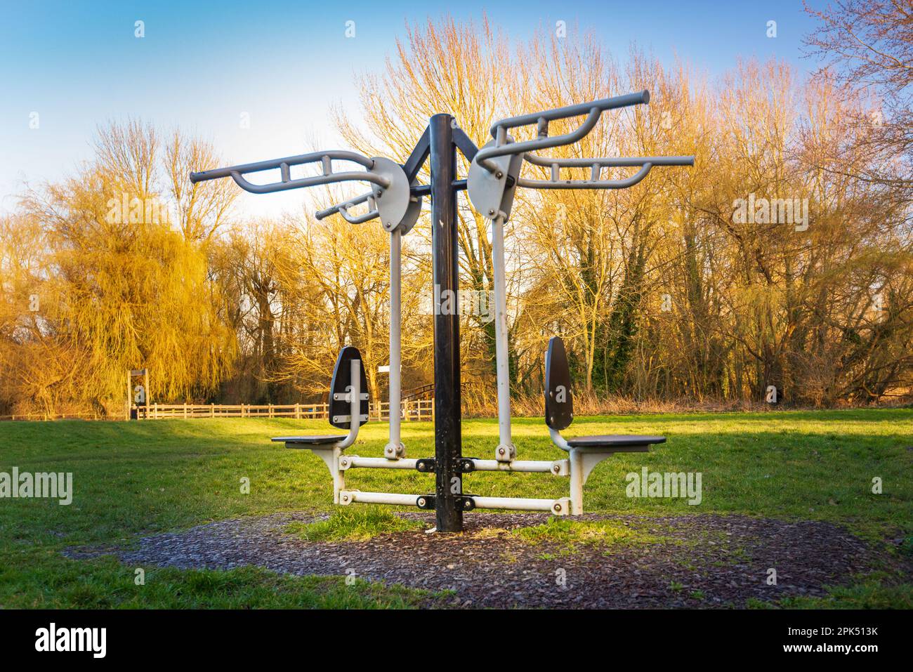 Outdoor gym exercise equipment at public park sports area. Weights ...
