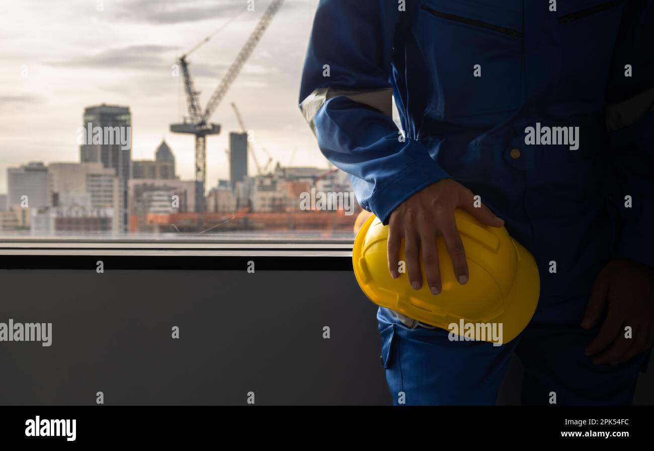 Engineer at building construction site, Safety first equipment Stock