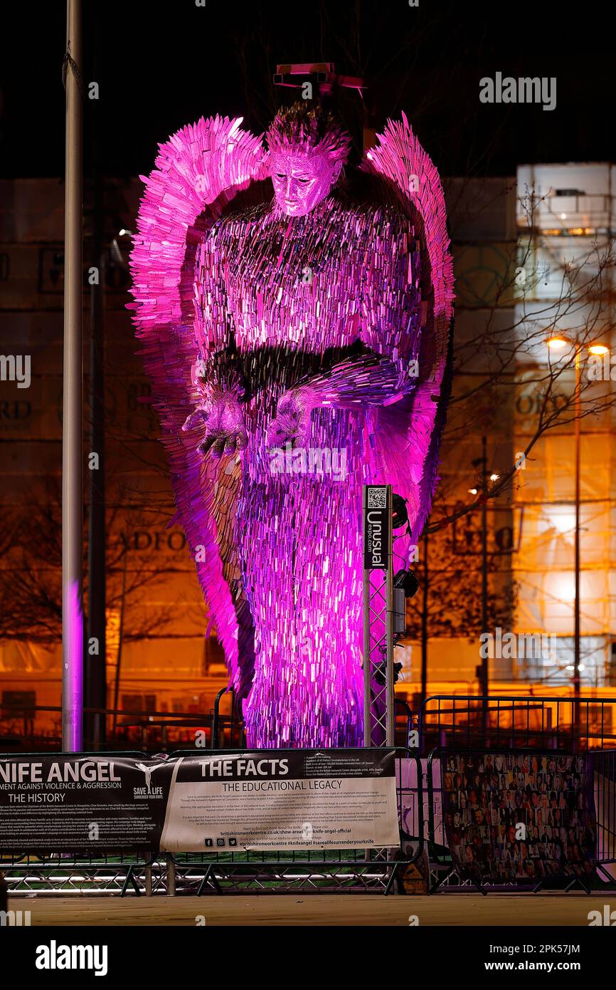 The Knife Angel sculpture illuminated in Purple after been unveiled in