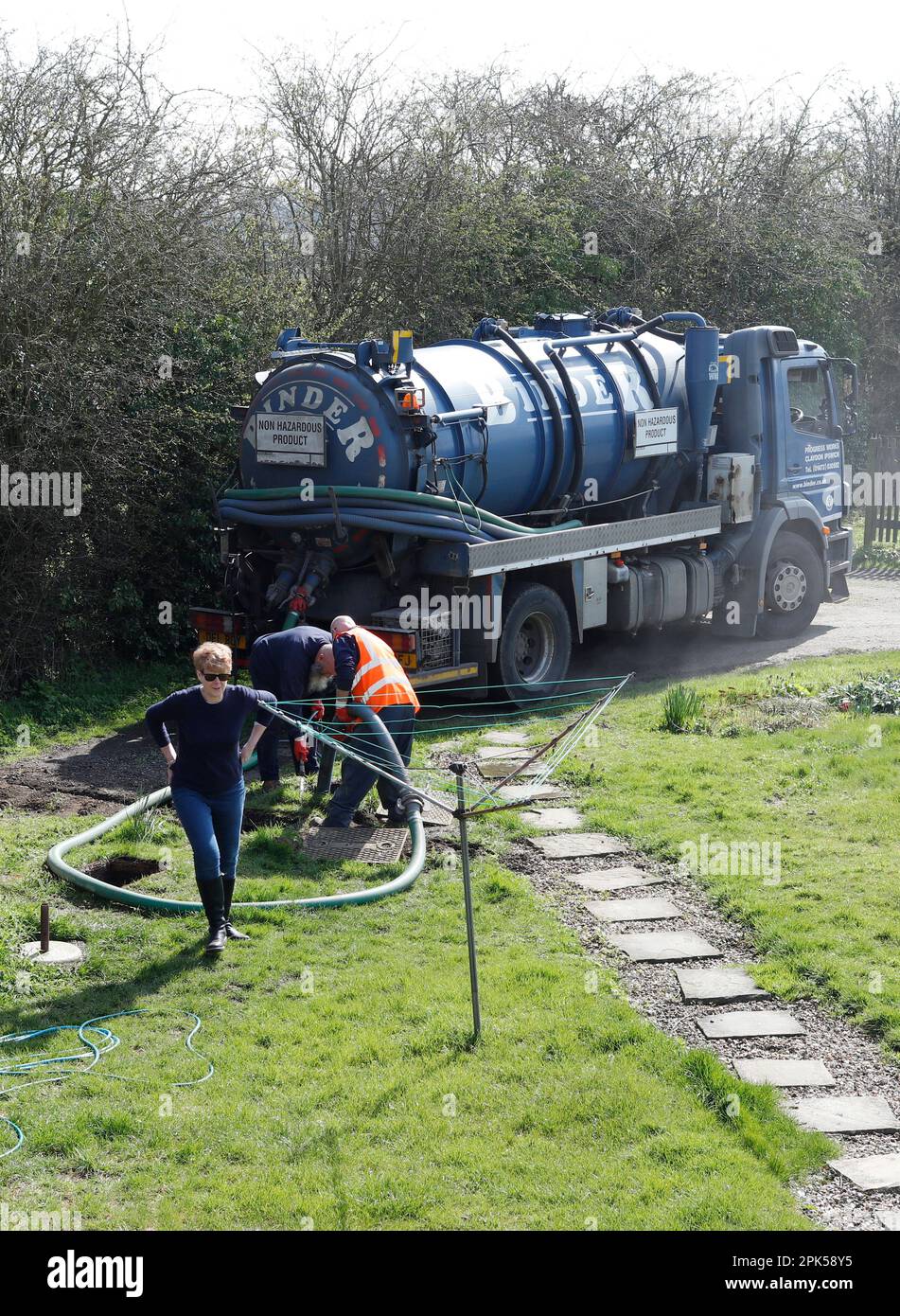 Emptying a domestic septic and cesspit tank, England, United Kingdom Stock Photo
