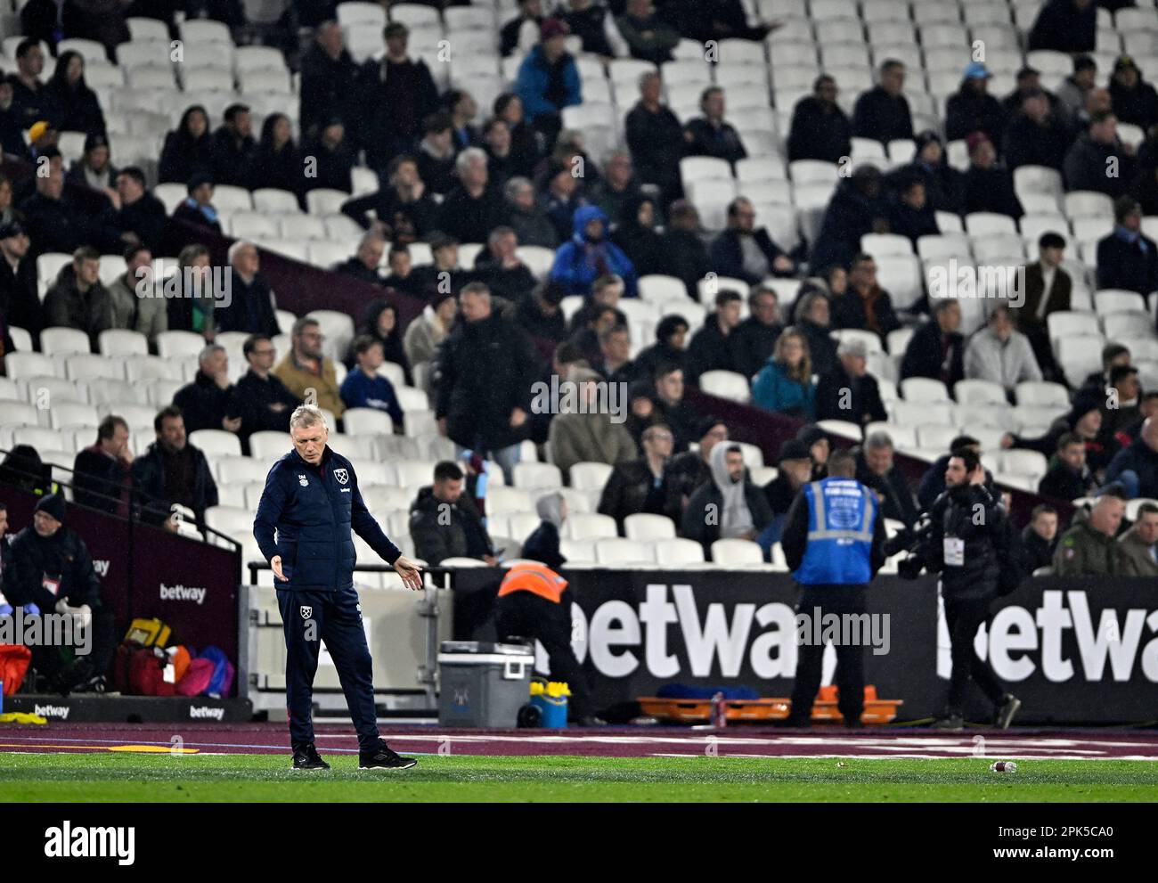 London, UK. 5th Apr, 2023. David Moyes (West Ham manager) looks at the ground in disappointment as there are plenty of empty seats behind him during the West Ham vs Newcastle Premier League match at the London Stadium, Stratford. Credit: MARTIN DALTON/Alamy Live News Stock Photo