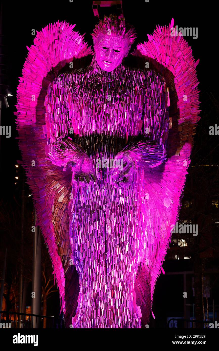 The Knife Angel sculpture illuminated in Purple after been unveiled in