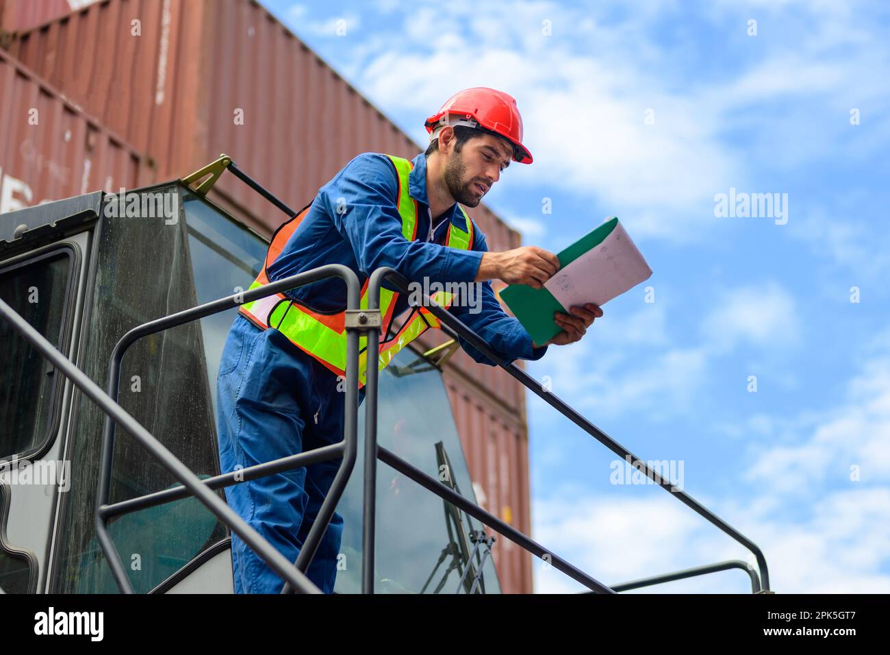 Warehouse engineer worker working at industrial container yard Stock ...