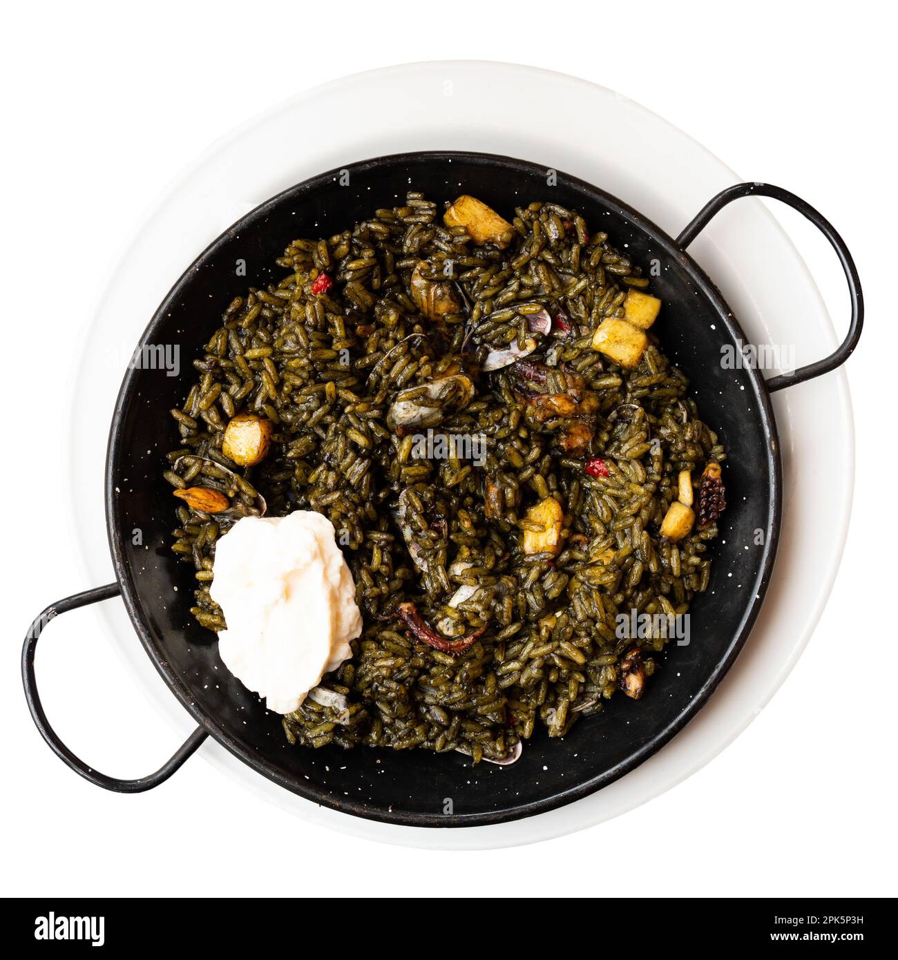 Traditional Catalan black paella with cuttlefish ink served with aioli