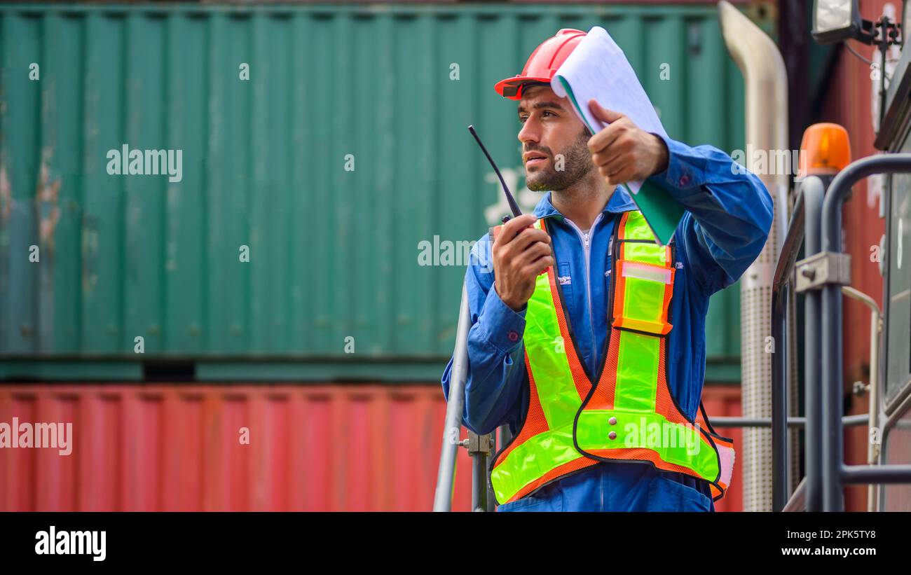 Warehouse engineer worker working at industrial container yard Stock ...