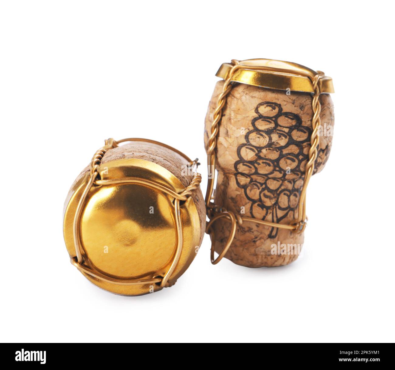 Corks of sparkling wine and muselet caps on white background Stock
