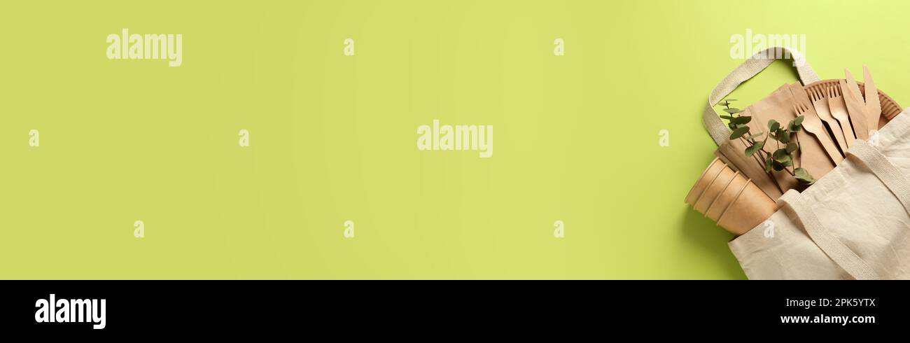 Flat lay composition with eco friendly products on light green ...