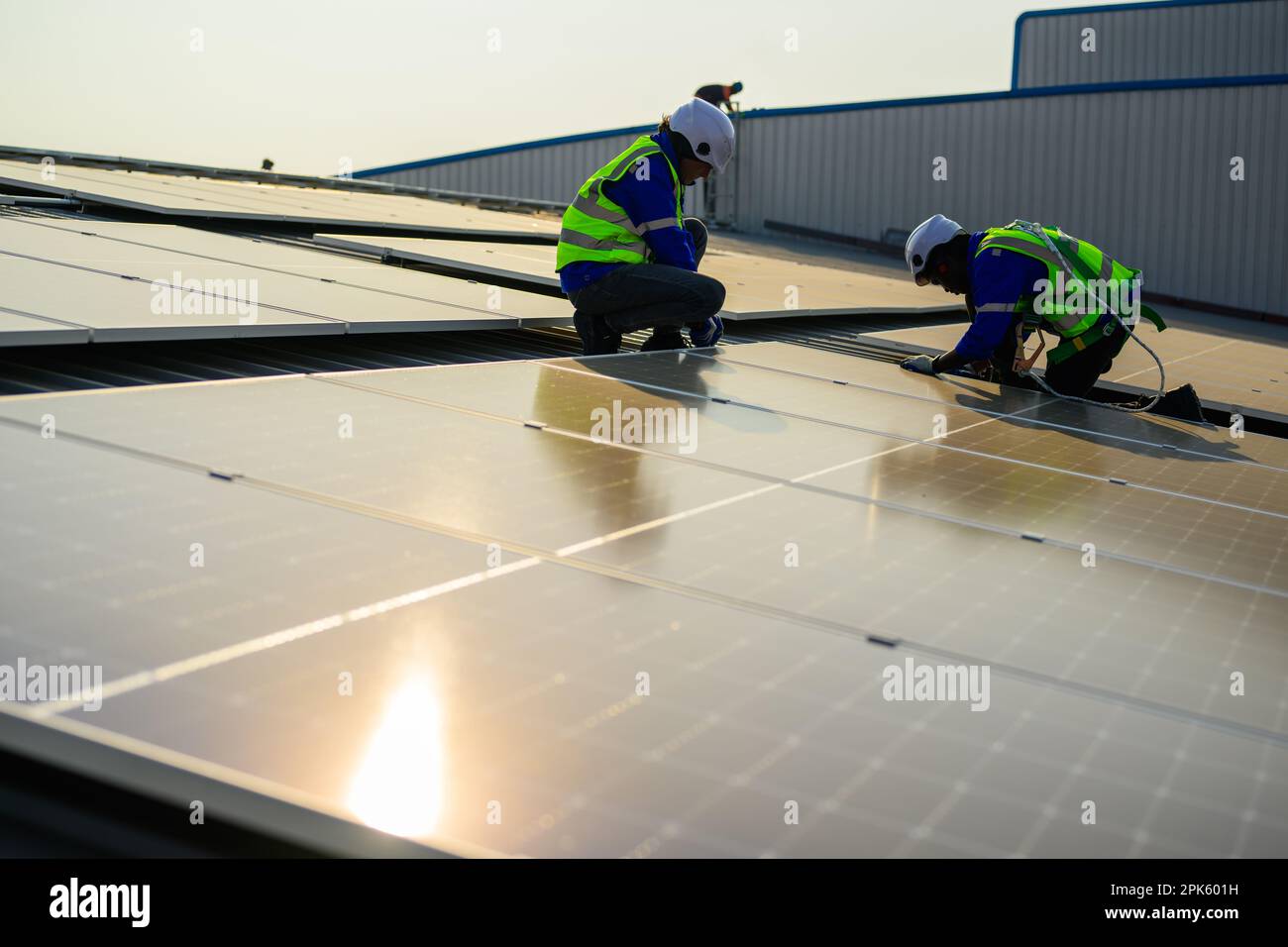 Engineer and technician using laptop checking solar panels system  Stock Photo