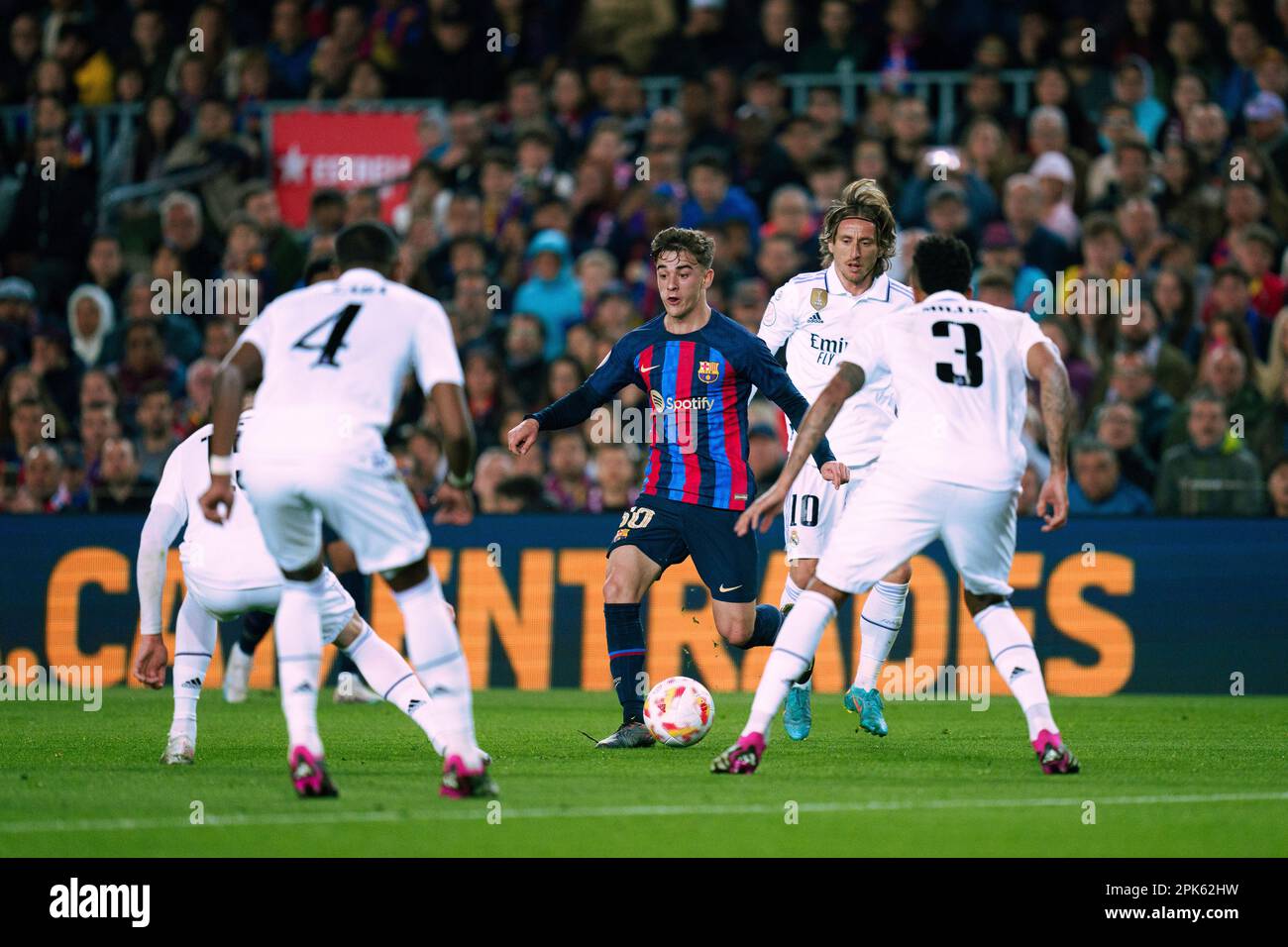 Barcelona, Spain. 5th Apr, 2023. Gavi (C) of Barcelona comeptes during the King's Cup semifinal second leg match between FC Barcelona and Real Madrid in Barcelona, Spain, April 5, 2023. Credit: Joan Gosa/Xinhua/Alamy Live News Stock Photo