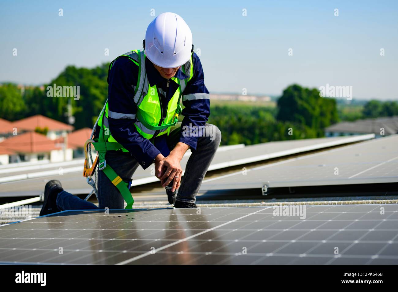 Professional engineer technician operating system at solar cell farm Stock Photo