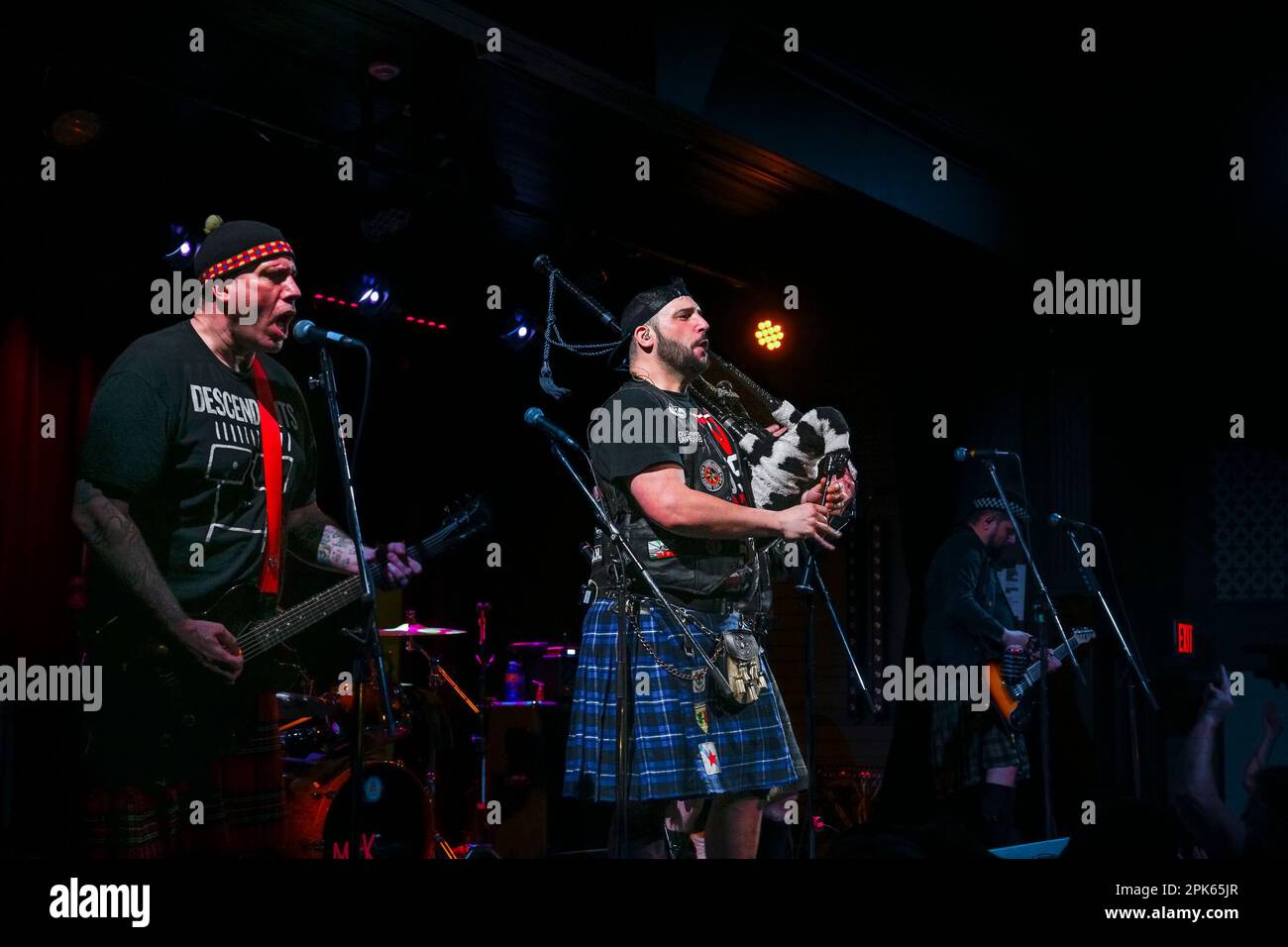 Piper, Aspy Luison, bagpipes, The Real McKenzies, Canadian Celtic punk band  in concert Stock Photo - Alamy