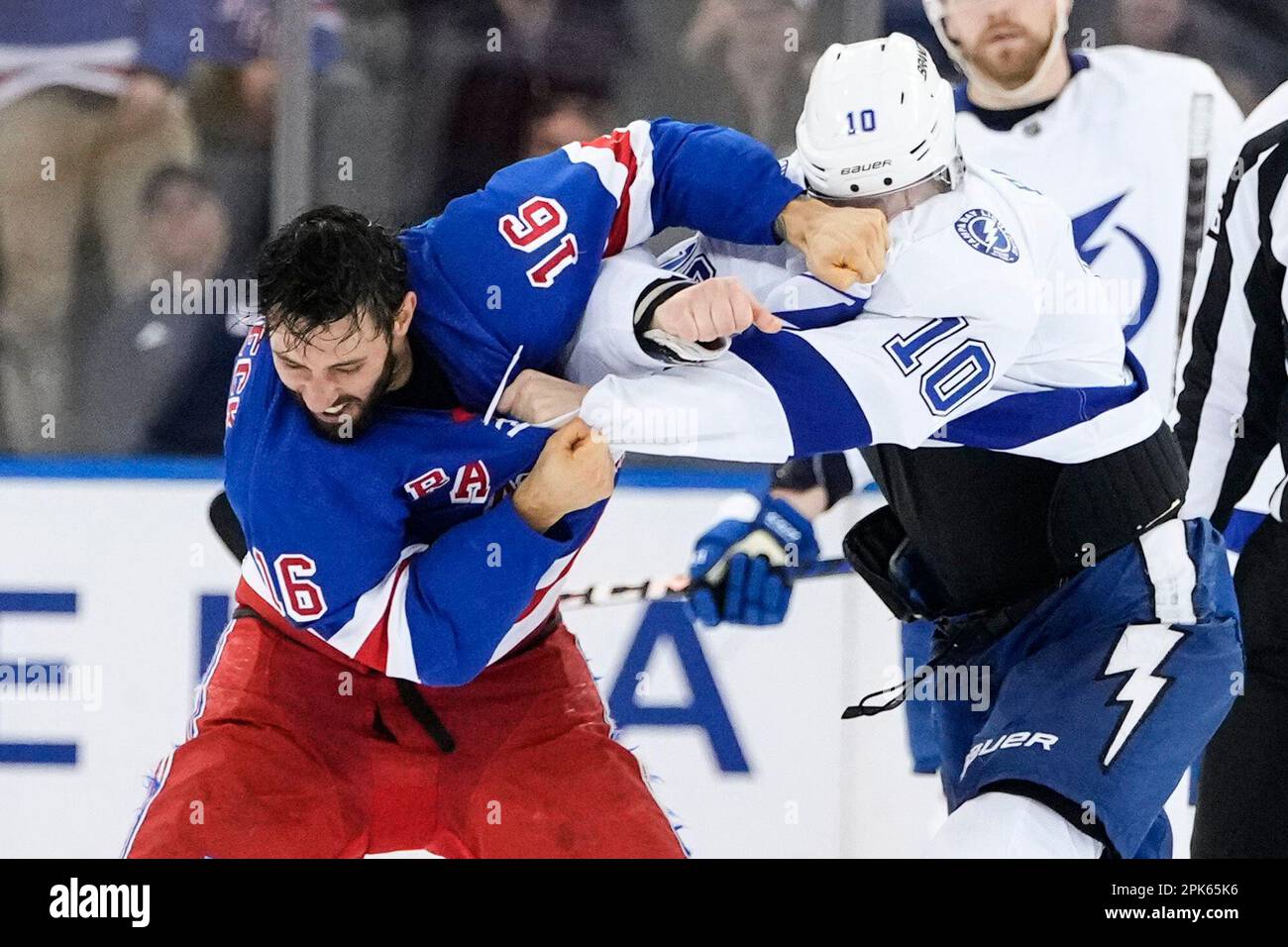 New York Rangers' Vincent Trocheck (16) fights Tampa Bay Lightning's