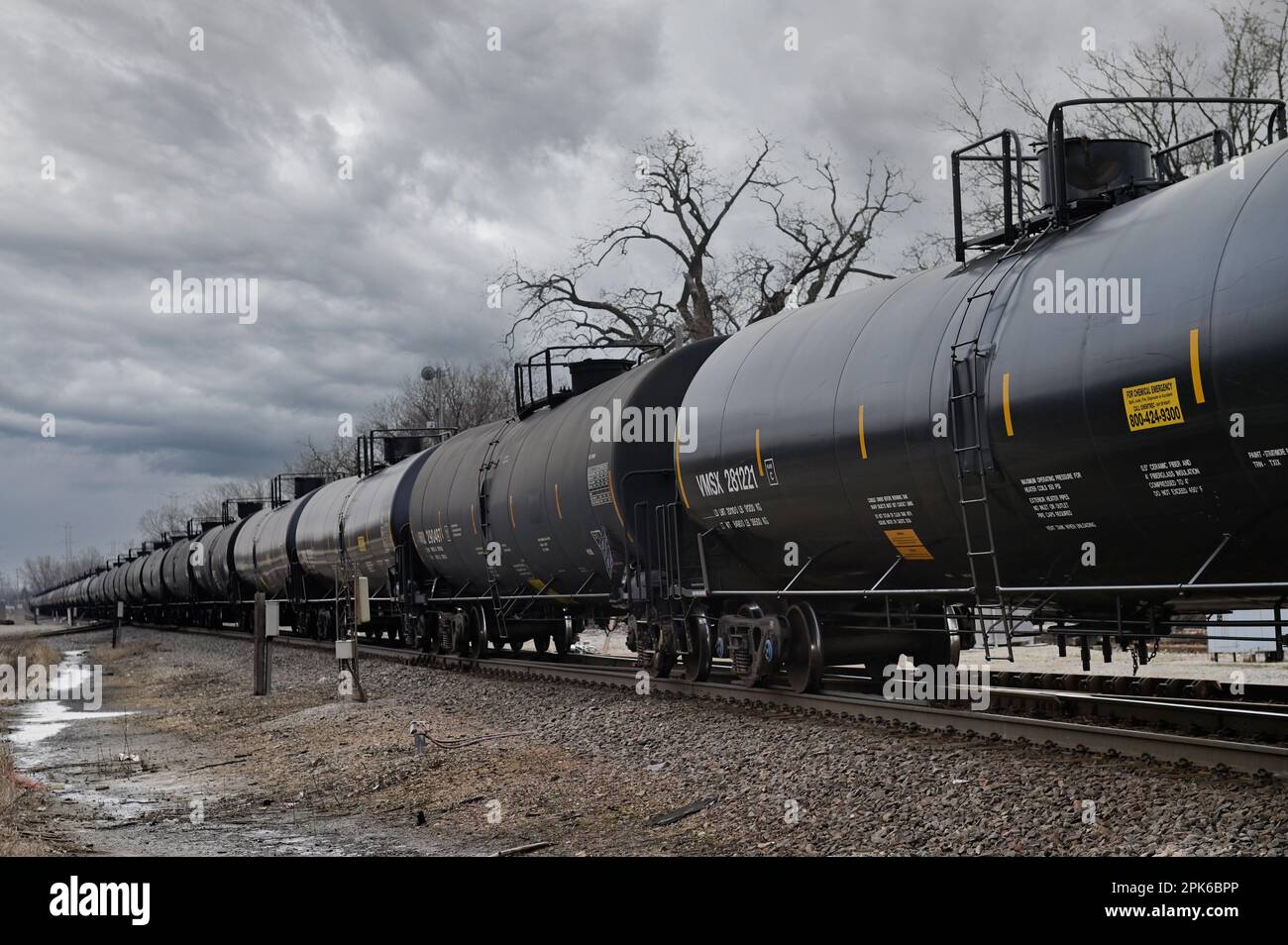 Elgin, Illinois, USA. A string of tank cars in a freight train passing through a northeastern Illinois. Stock Photo