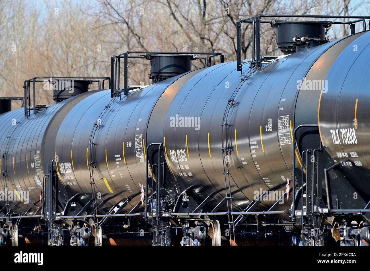 Elgin, Illinois, USA. A string of tank cars in a freight train passing through northeastern Illinois. Stock Photo