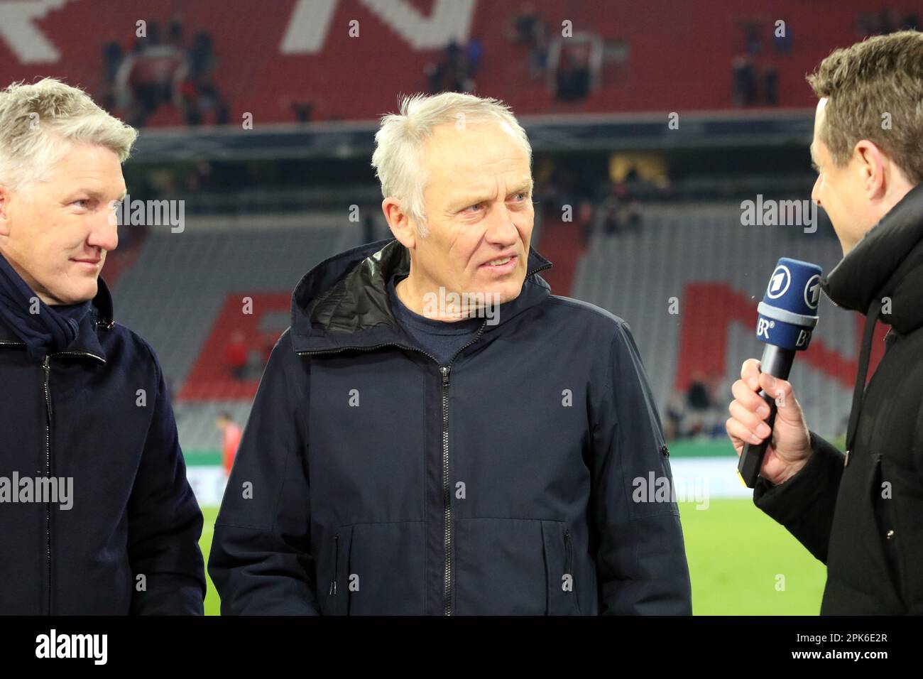 Christian streich and ard television reporter alexander bommes w hi-res ...