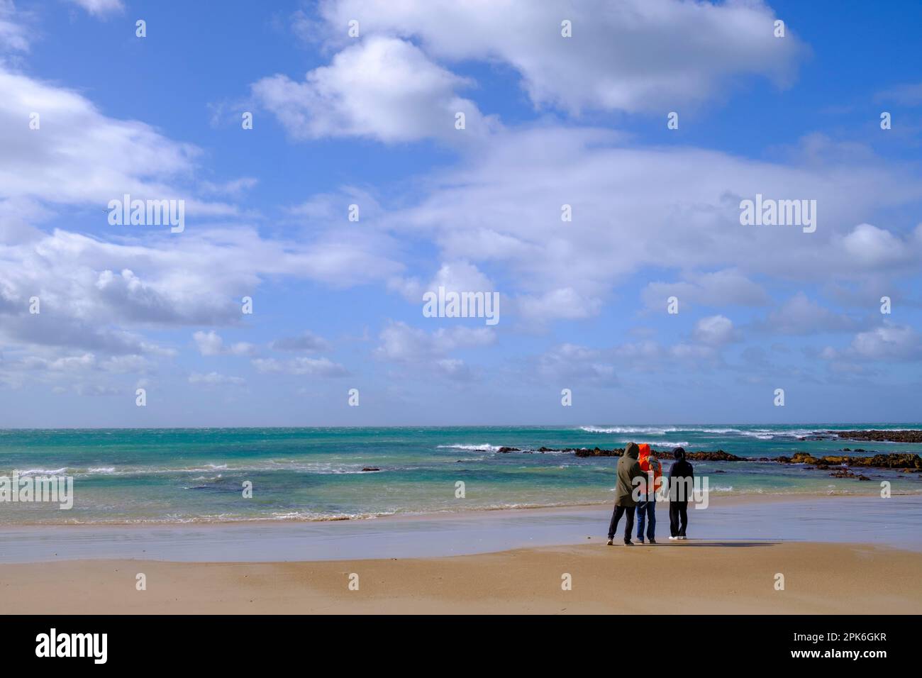 Beach walkers, Jeffreys Bay near Port Elizabeth, Garden Route, Eastern Cape, South Africa Stock