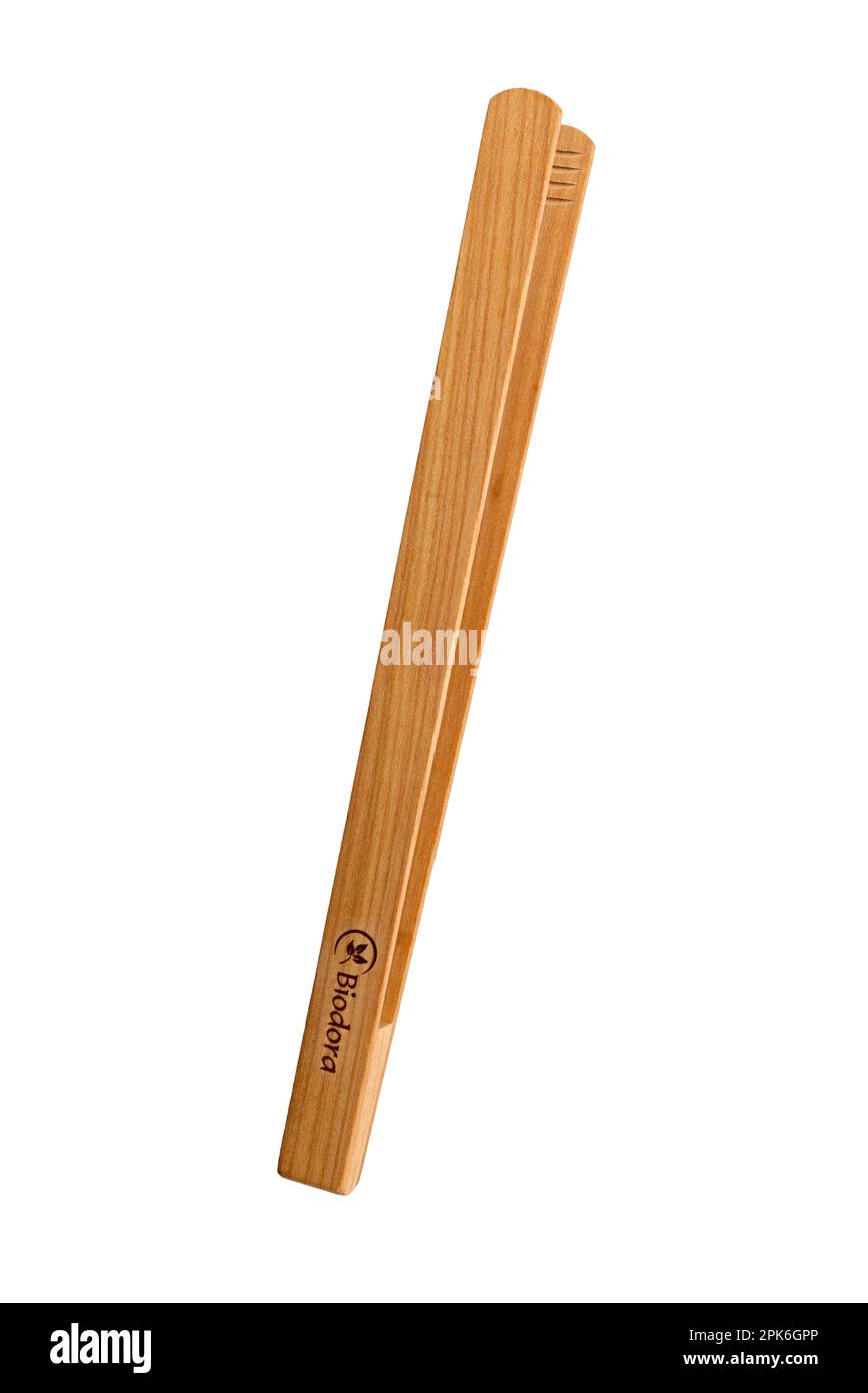 Barbecue tongs, kitchen utensil, wood Stock Photo