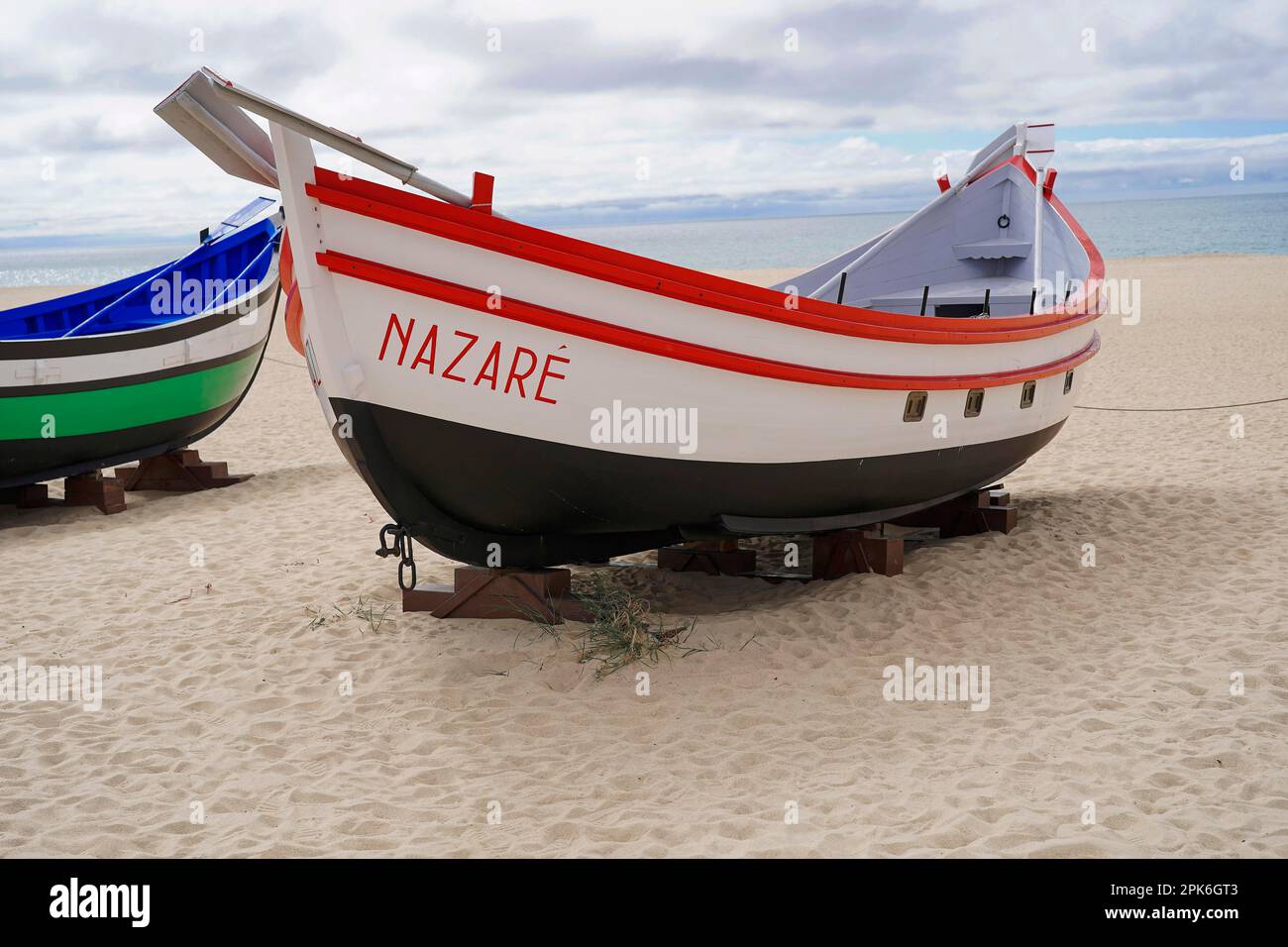 Fishing boats, Praia da Nazare beach, Nazare, Oeste, Leiria district, Portugal Stock Photo
