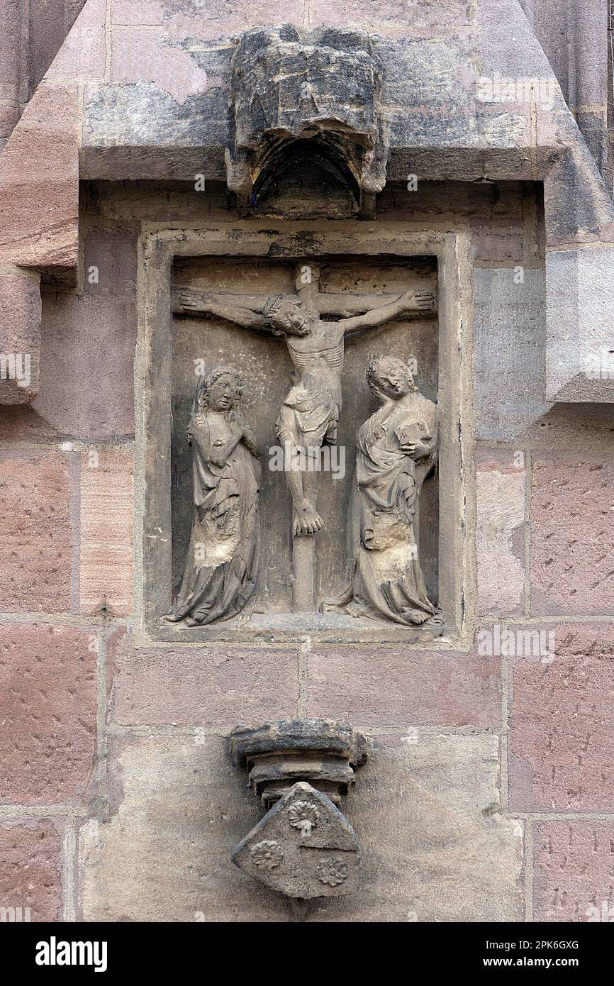 Relief depiction of a crucifixion scene at the Lorenzkirche, Nuremberg, Middle Franconia, Bavaria, Germany Stock Photo