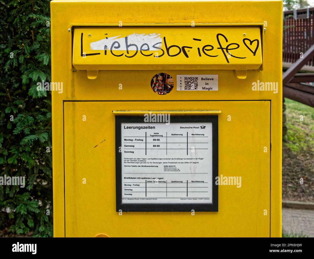 German Post Office letterbox with graffiti love letters, Lohmen, Saxony, Germany Stock Photo