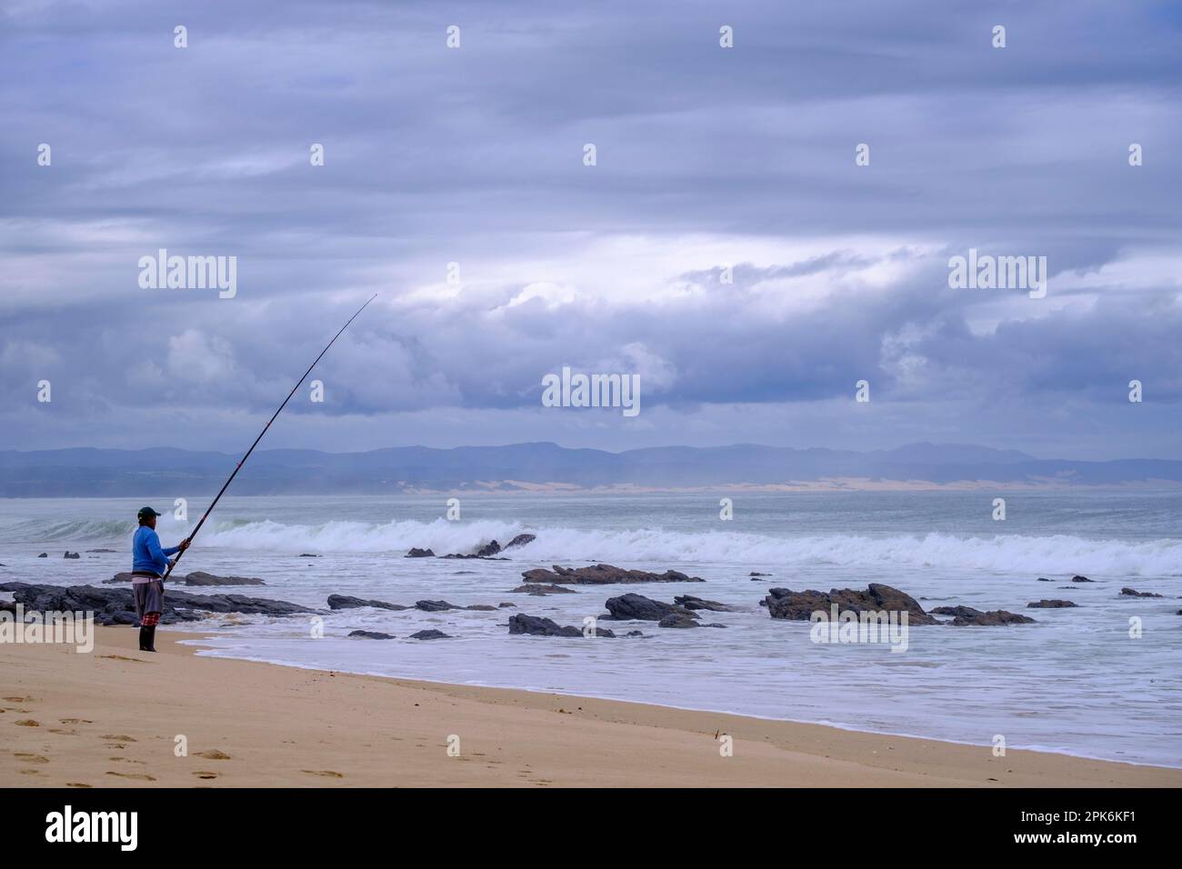 Anglers on the beach, bad weather, Jeffreys Bay near Port Elizabeth, Garden Route, Eastern Cape, South Africa Stock Photo