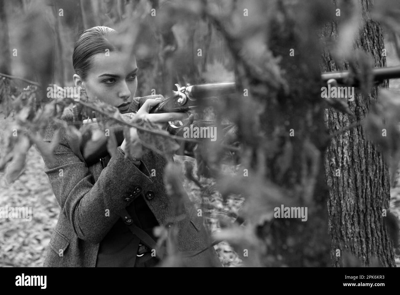 Waiting for Prey. female hunter in forest. successful hunt. hunting sport. girl with rifle. chase hunting. Gun shop. military fashion. achievements of Stock Photo