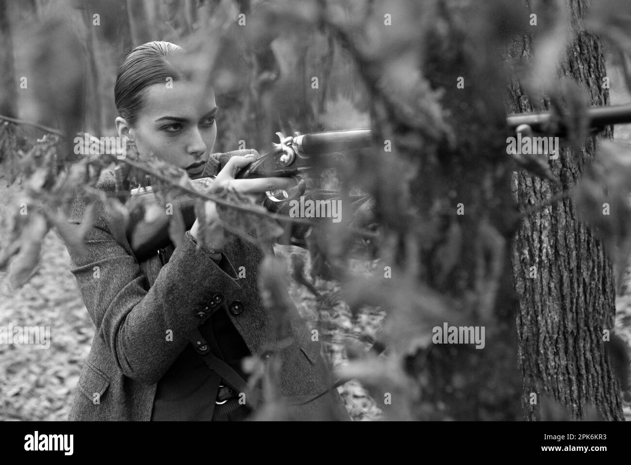 Waiting for Prey. female hunter in forest. successful hunt. hunting