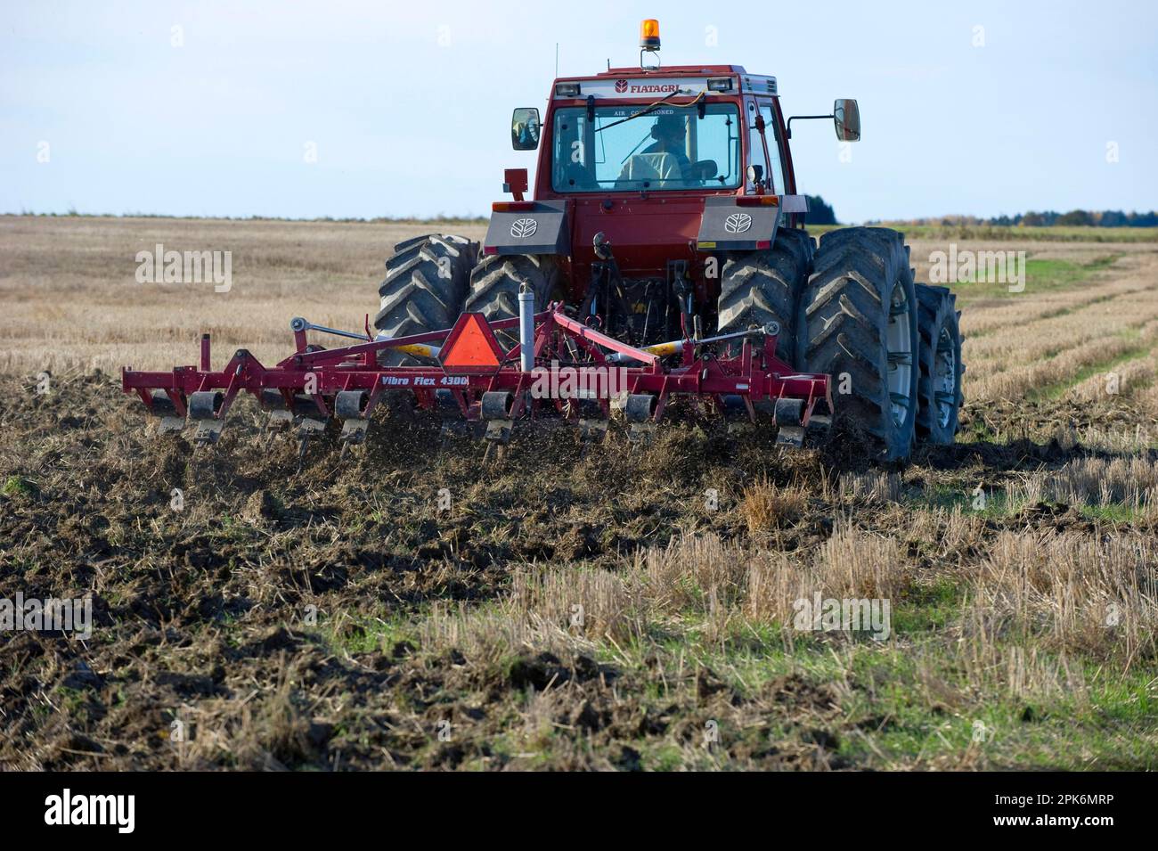 Fiatagri tractor with Vibro Flex 4300 cultivator, stubble cultivation, Sweden Stock Photo