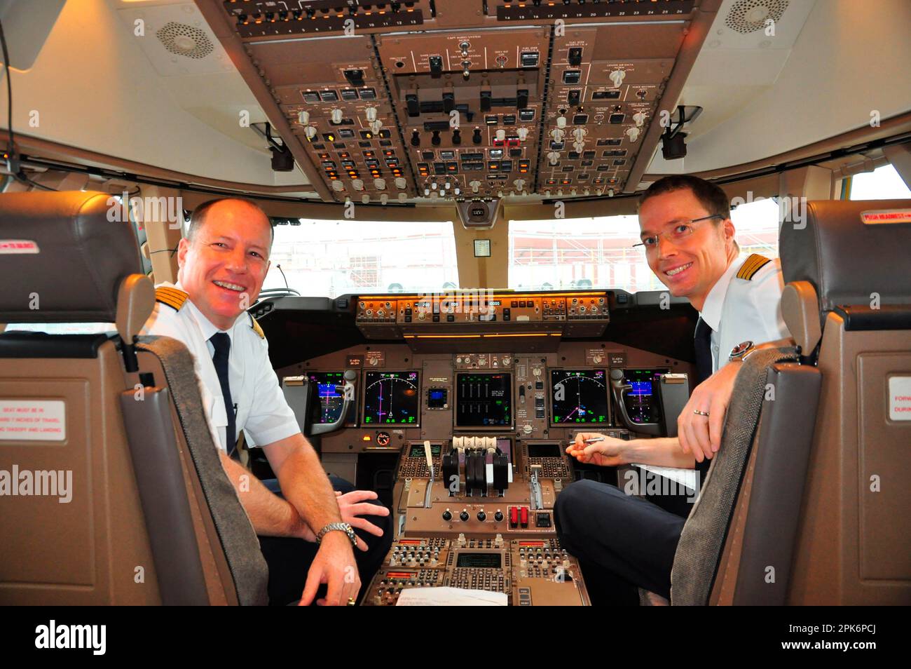 Civil aviation, Boeing 747-8, interior, cockpit, chief pilot, copilot, passenger aircraft Stock Photo