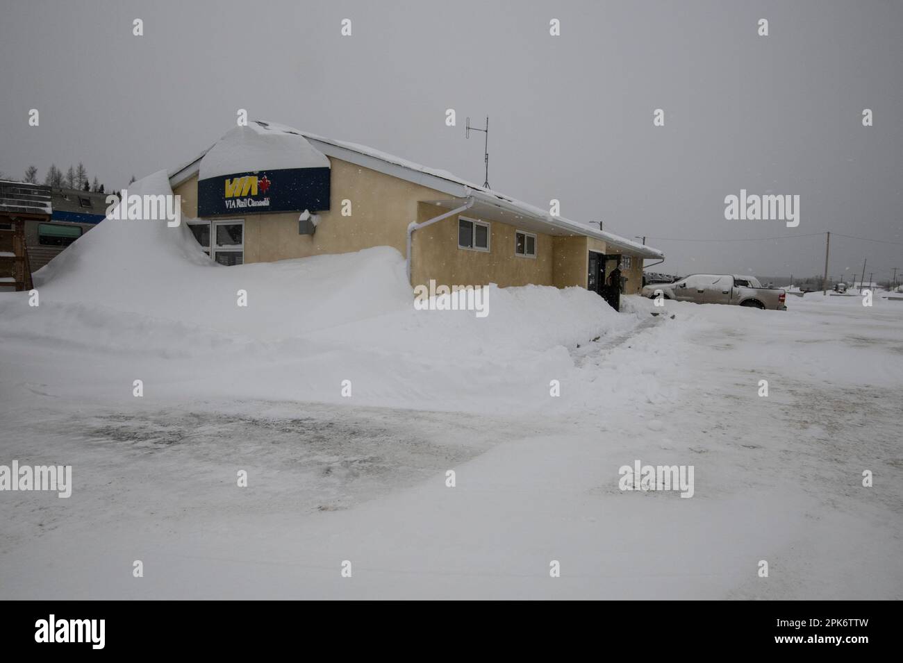 Thompson Station building with snow drifts at the industrial park in