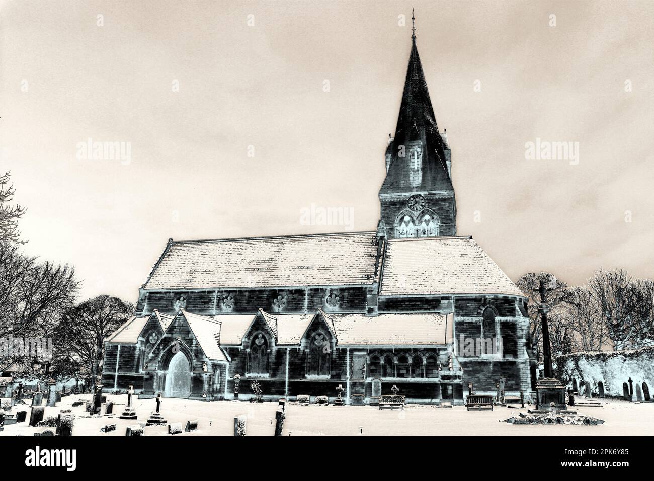 St Barnabas' Church, Bromborough, Wirral, UK. Photo effect after unusual snowfall March 2023 Stock Photo