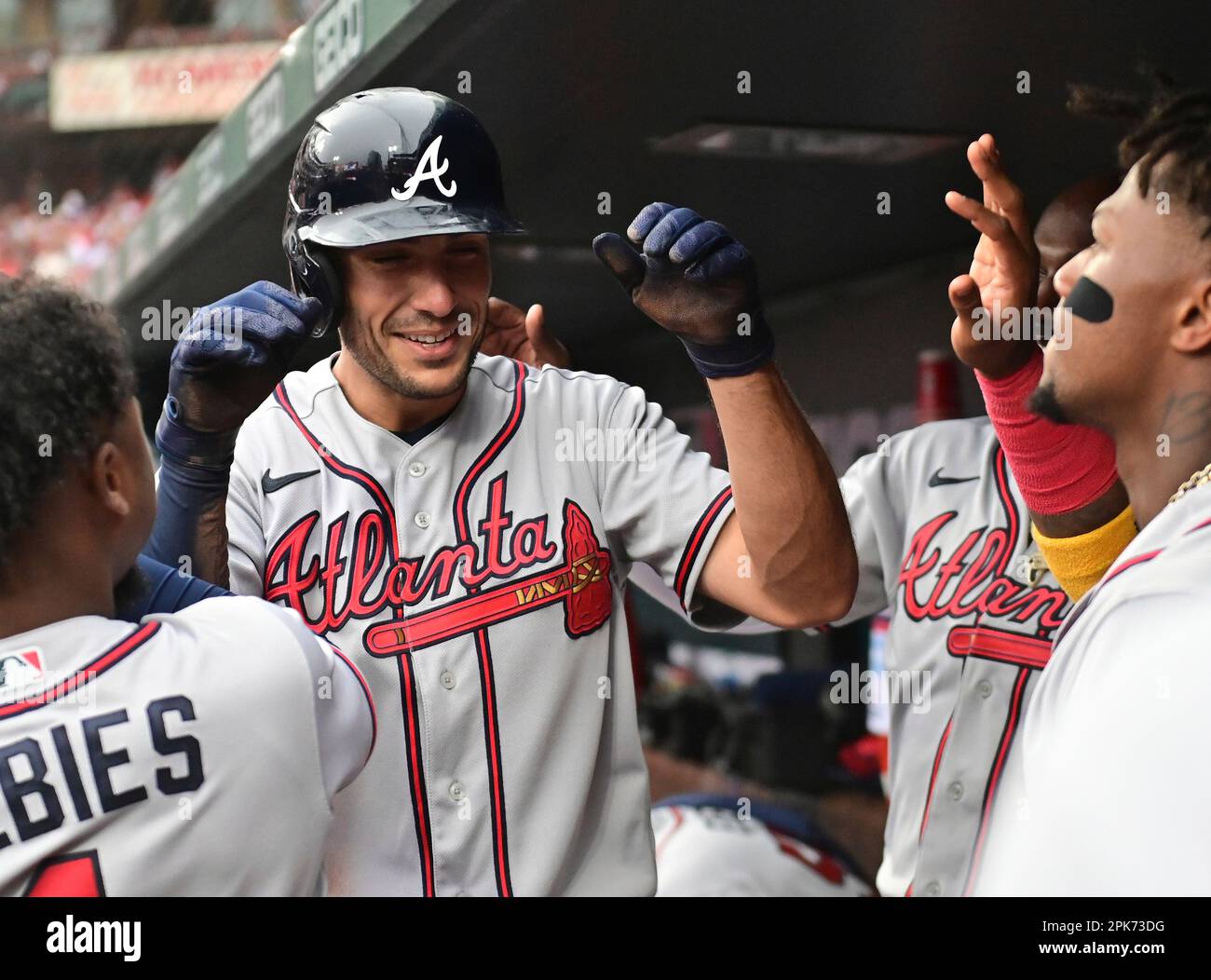 ST. LOUIS, MO - APRIL 05: Atlanta Braves first baseman Matt Olsen (28) is  congratulated bye teammates in the second inning after scoring on a solo  home run during an MLB game