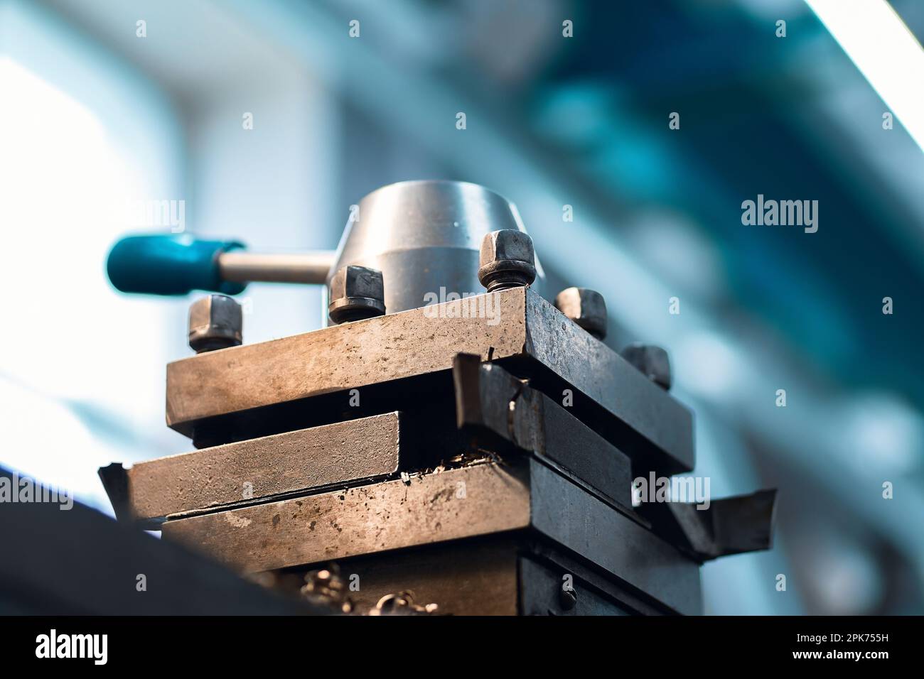 This is part of closeup metal lathe. Industrial equipment for metal