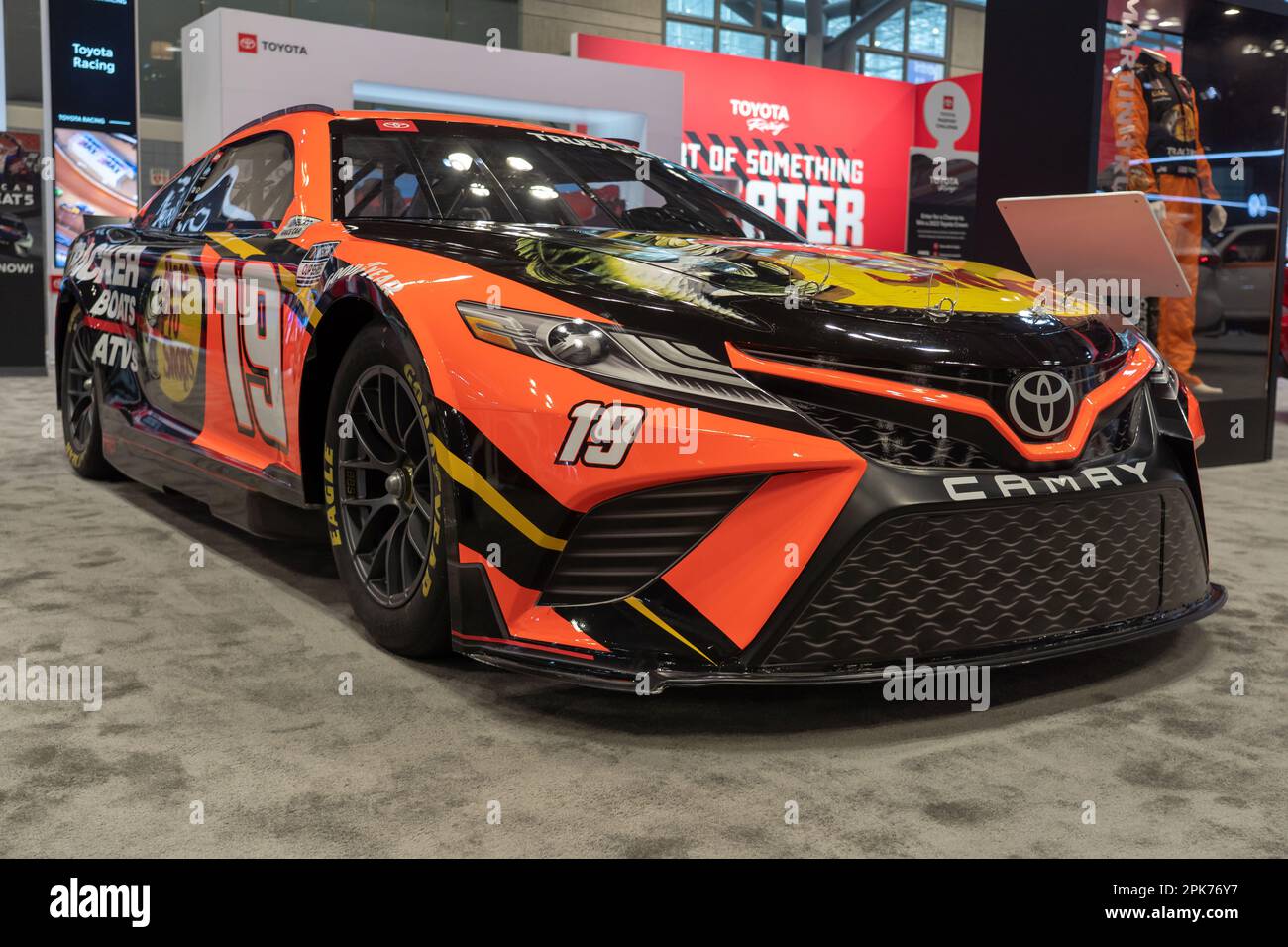 New York, United States. 05th Apr, 2023. NEW YORK, NEW YORK - APRIL 05: A Joe Gibbs Racing #19 Camry Cup Car driven by Martin Truex Jr. seen at the International Auto Show press preview at the Jacob Javits Convention Center on April 5, 2023 in New York City. Credit: Ron Adar/Alamy Live News Stock Photo