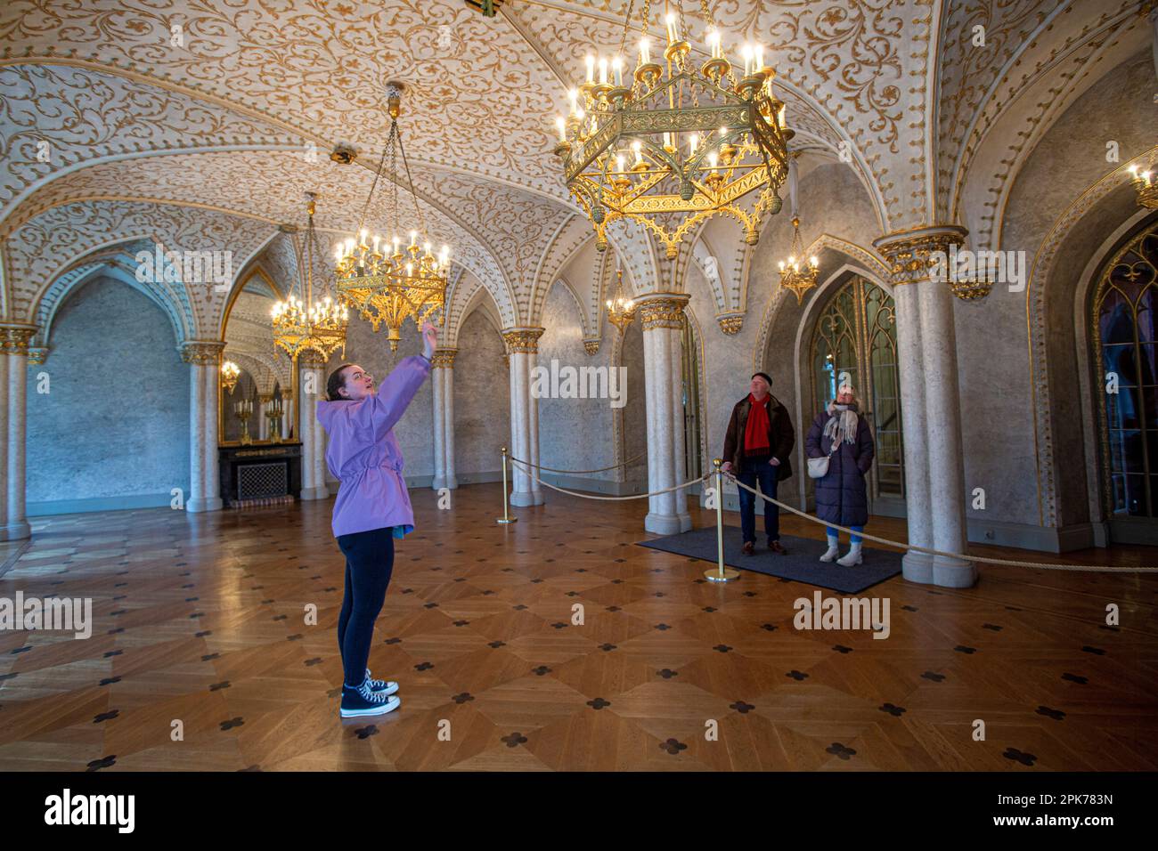 Guide with tourists showing the Interior of Rosenau Palace , birthplace of Prince Albert, consort of Queen Victoria, Coburg, Bavaria, Germany, Europe Stock Photo