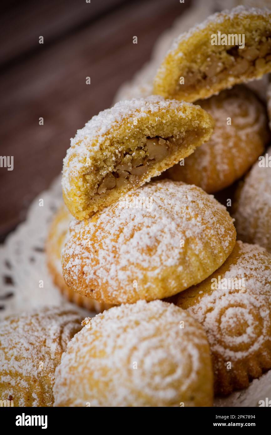 Traditional eid maamoul or mamoul cookies with dates, nuts, and jam