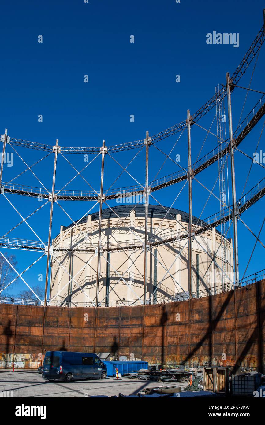 Old gasholders, column-supported from inside, against clear blue sky in Suvilahti district of Helsinki, Finland Stock Photo