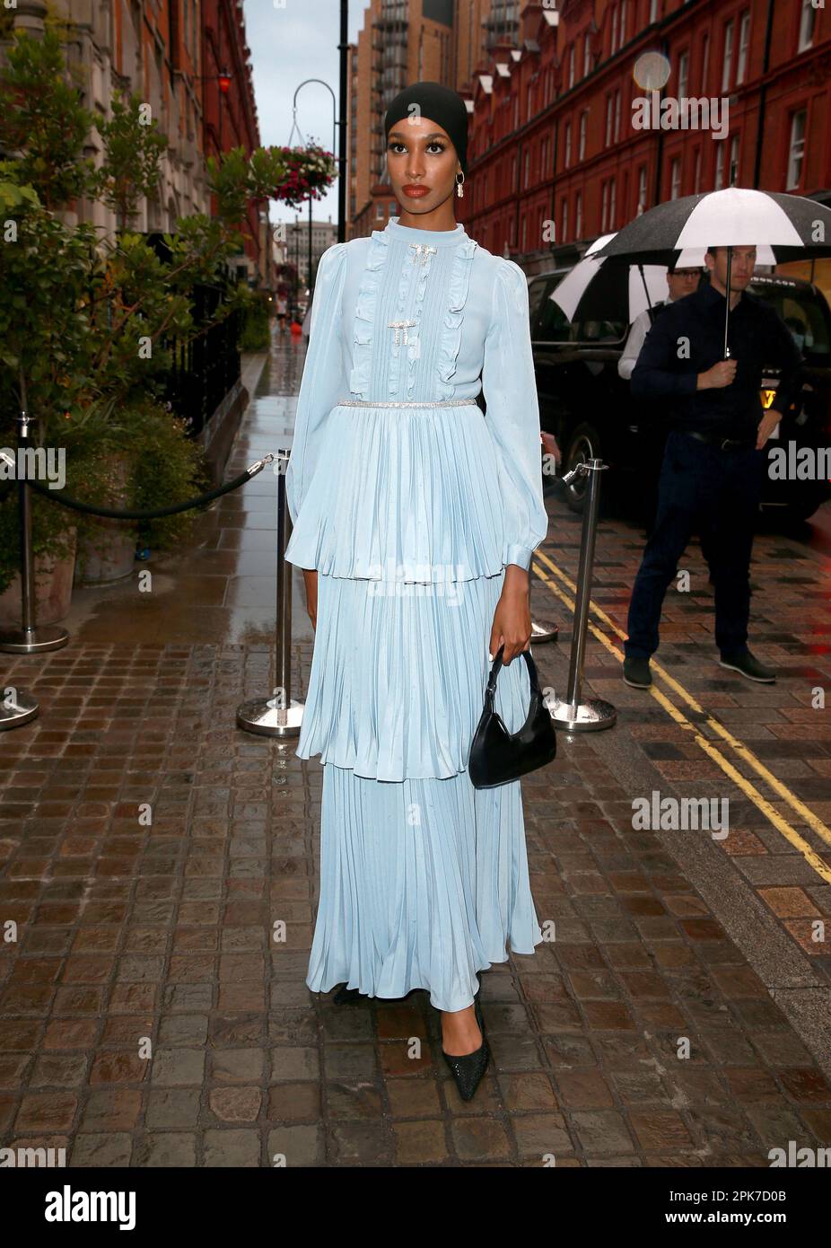 Ikram Abdi Omar attends the British Vogue X Self-Portrait Summer Party