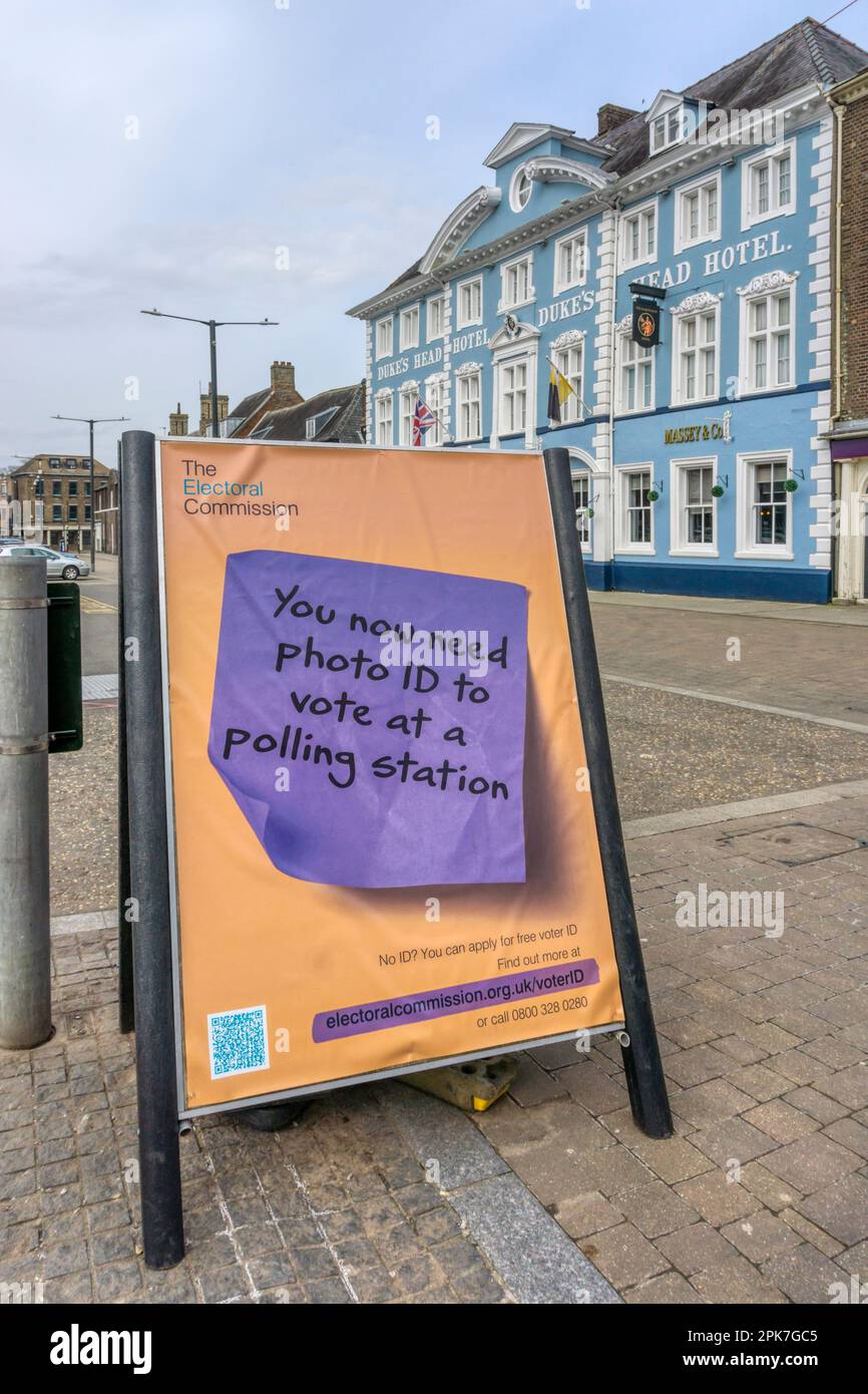 An Electoral Commission sign in King's Lynn Tuesday Market Place warns that Photo ID is now needed to vote at a polling station. Stock Photo