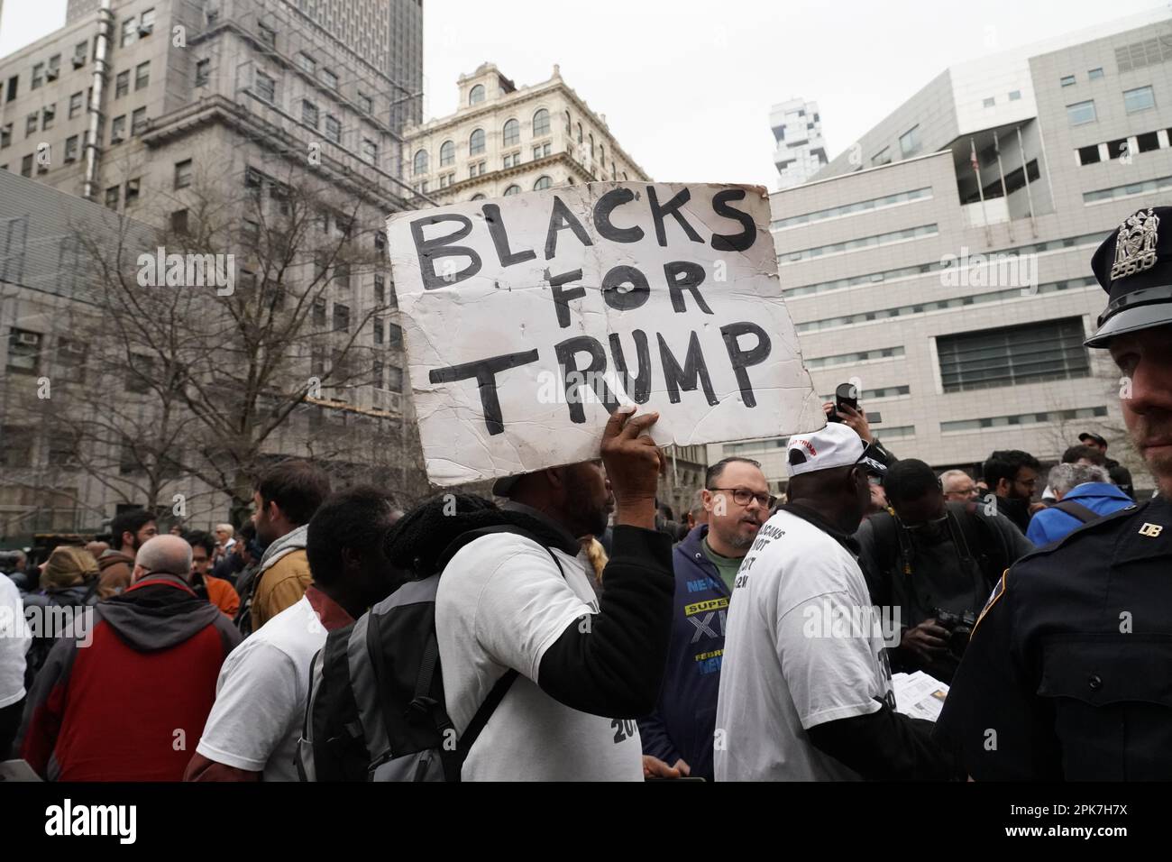 New York, United States. 03rd Apr, 2023. A Pro-Trump supporter holds a placard reading "Blacks for Trump" during a demonstration outside Trump Tower in support of Donald Trump prior to Trump's indictment by the Manhattan D.A. Credit: SOPA Images Limited/Alamy Live News Stock Photo