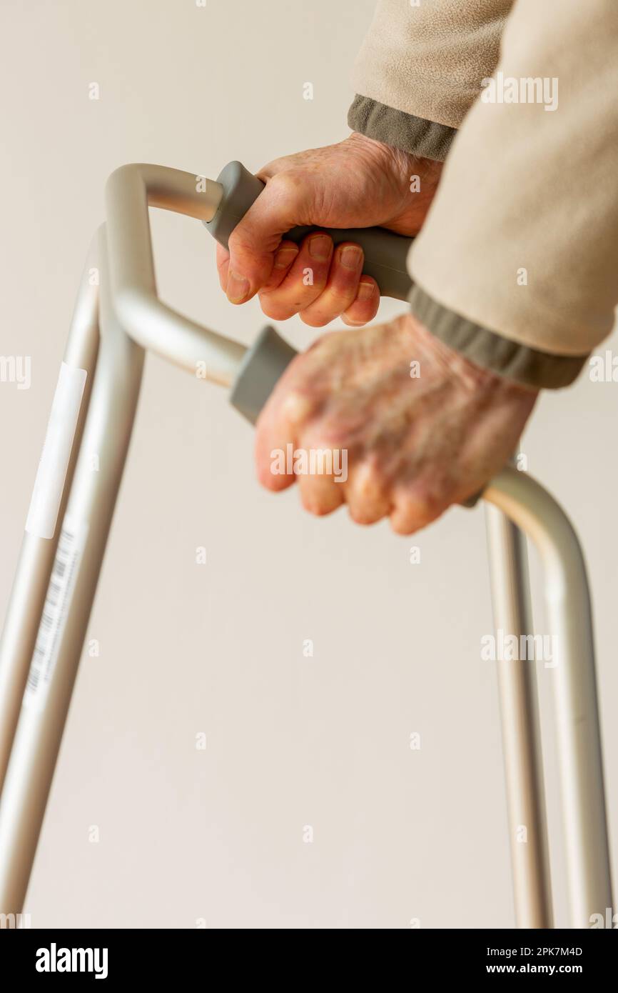 Close up of hands on a zimmer frame Stock Photo Alamy